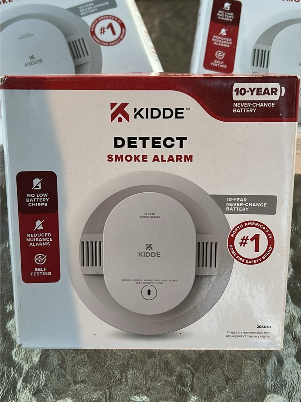 Brand New- Kidde Detect Smoke Alarm - White with Red Accents w/ 10 yr battery.